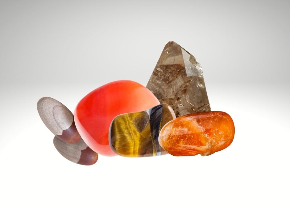 Shiva lingam, tiger's eye, and smokey quartz are brown. Carnelian and spessartine garnet are orange.